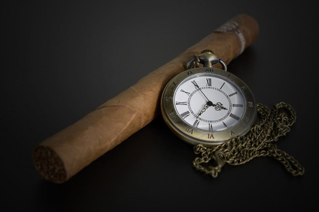 cigar with a watch